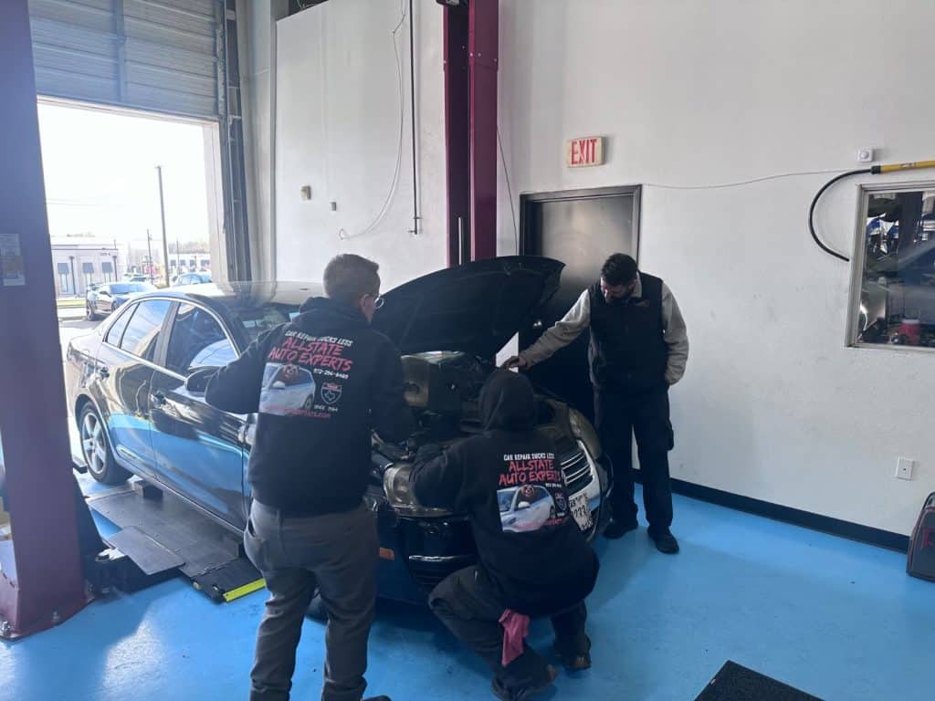 AllState Auto Repair Technicians working on a car